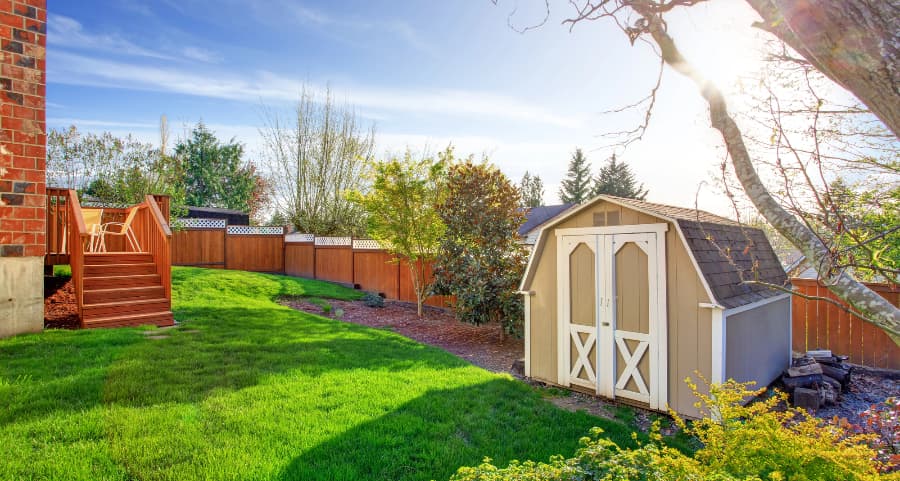 Fenced backyard with storage shed in Birmingham